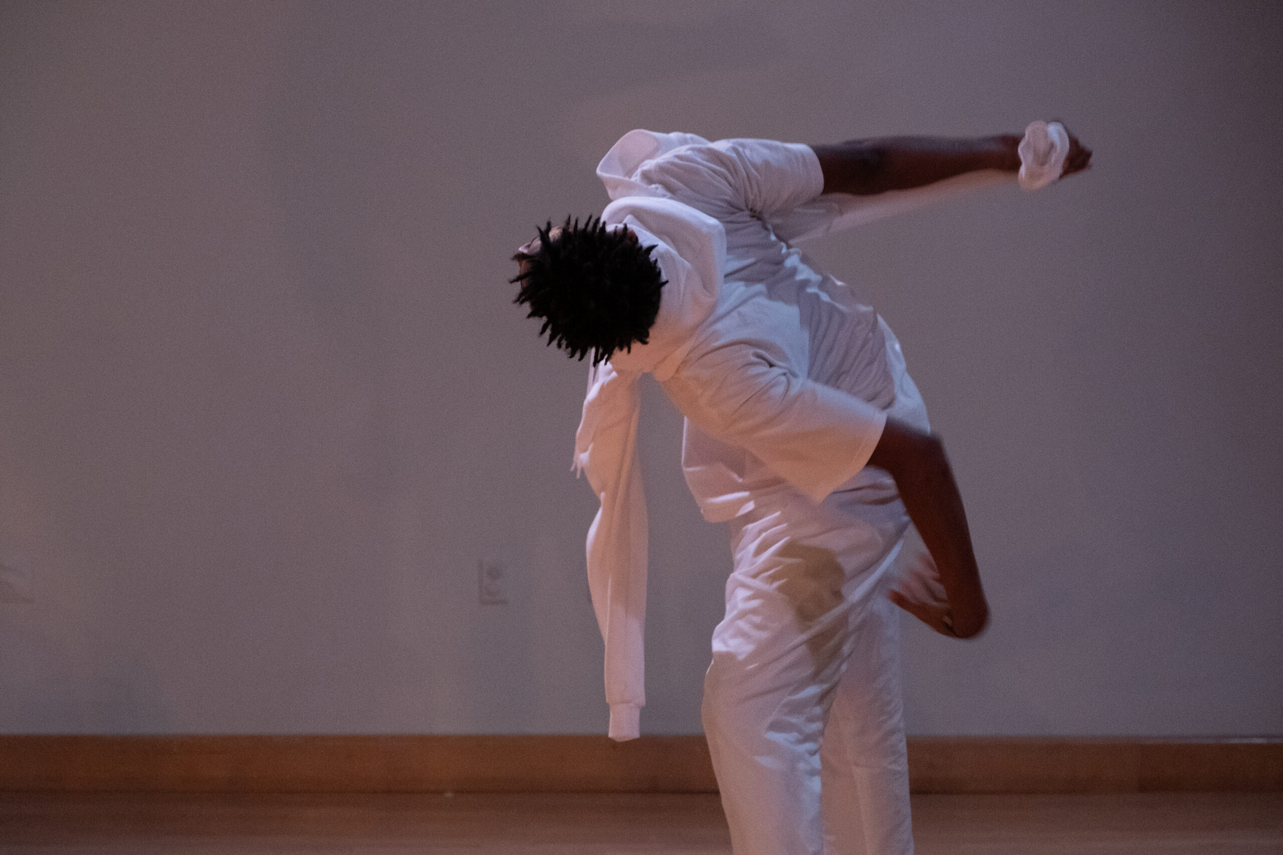 Photo of a dancer dressed in white