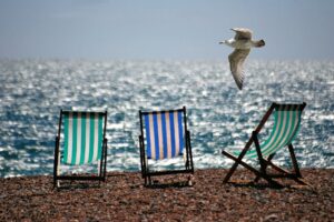 Photos of chairs at the beach